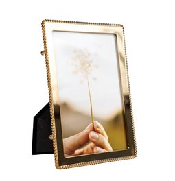Photo frame Kaira, gold color, 10x15cm photograph, H17x12x10cm